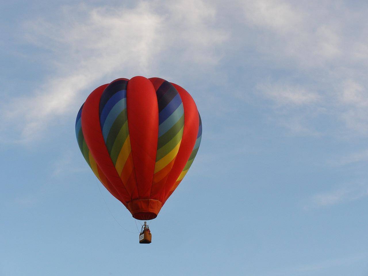 Who were the first passengers in the hot air balloon?
